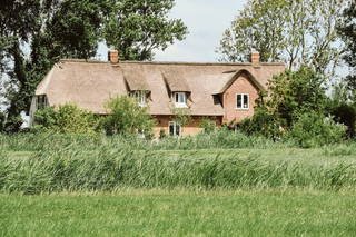 Landhaus Huus Uelvesbüll - Unser Huus Uelvesbüll in Alleinlage inmitten der Weite von Eiderstedt
