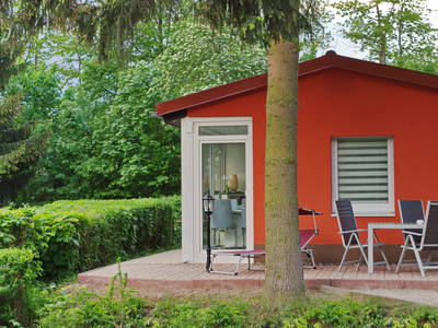 Terrasse mit Zugang über Wintergarten Deluxe Bungalow