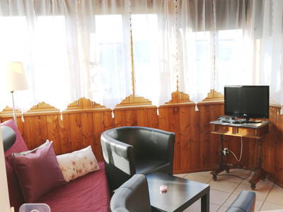 Ferienwohnung Kellerkatz - Veranda mit gemütlicher Sitzecke