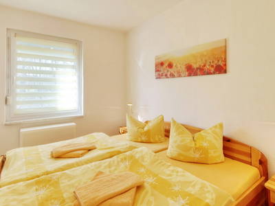 Schlafzimmer 1 Standard und Comfort Bungalows