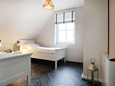 Schlafzimmer im OG mit zwei Einzelbetten