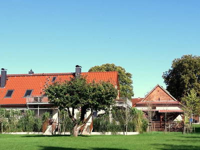 moderne Ferienwohnung und große überdachte Terrasse für gemeinsame Abende