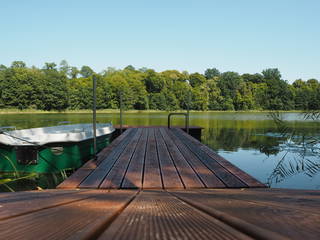 West Masuren: Ferienhaus direkt am See mit Steg, Boot, Sauna & Kamin aus Milakowo
